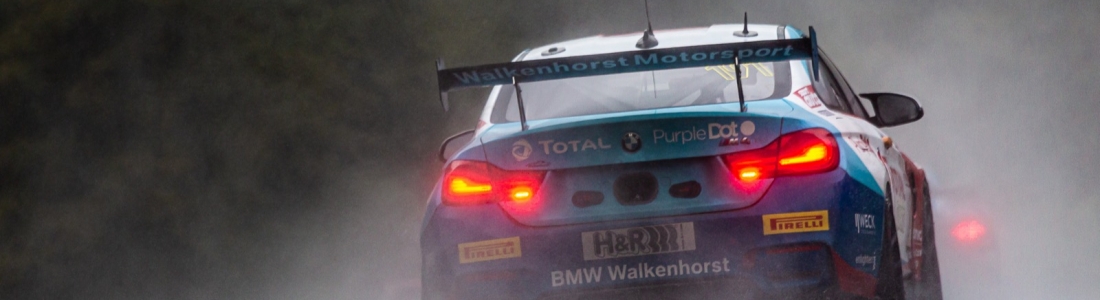 TUCK BATTLES CHALLENGES IN RAIN SOAKED RACE